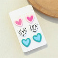 ARETES HEART DESIGN ANIMAL PRINT