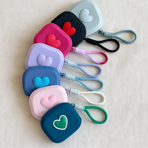 ESTUCHE DE SILICONA HEART DESIGN CON LAZO